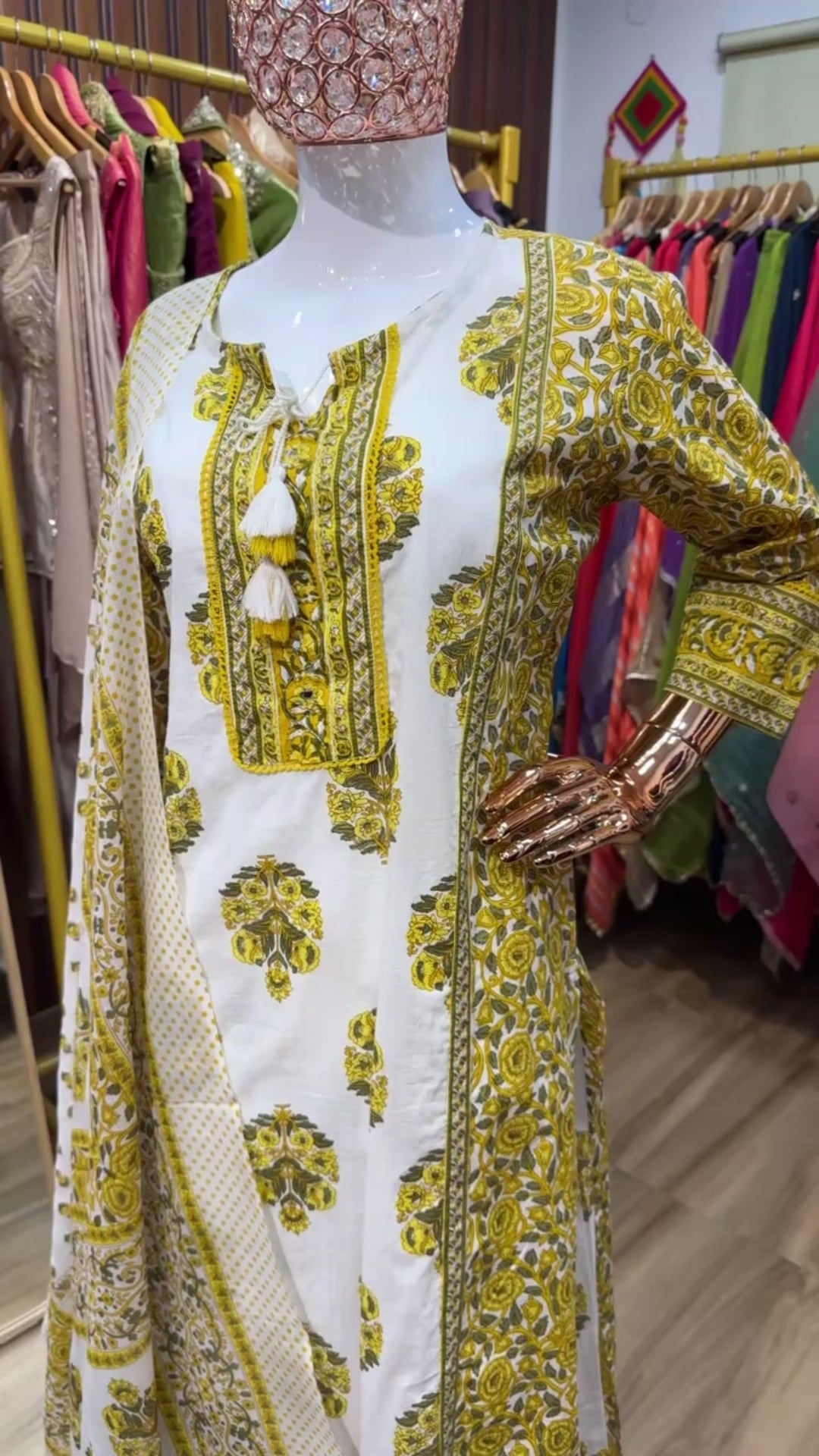 Yellow and white ajrak suit tessels