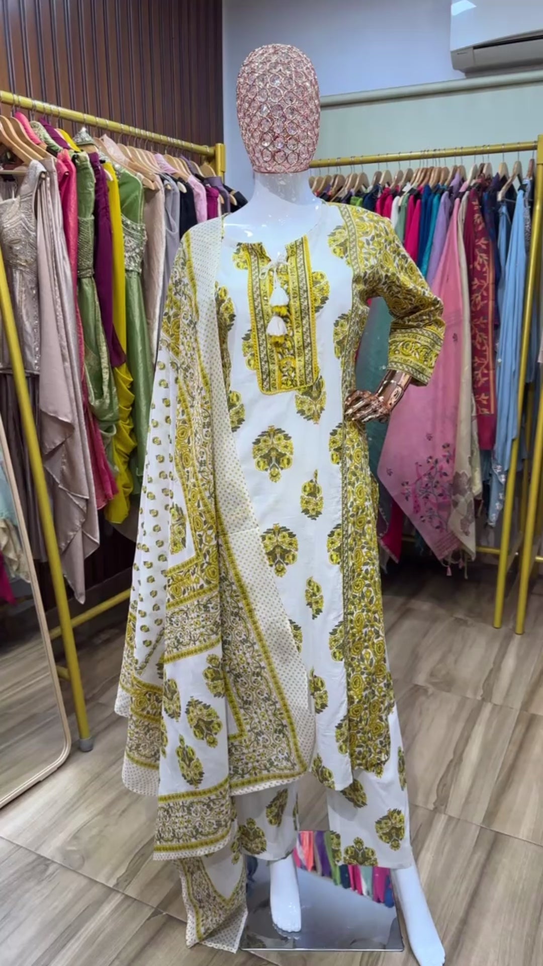 Yellow and white ajrak suit tessels